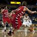 Michigan sophomore Trey Burke drives in the game against Saginaw Valley State on Monday. Burke had 16 points and eight assists. Michigan won 76-48. Daniel Brenner I AnnArbor.com